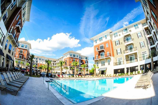 Outside pool area - The Flats at 4200, Across street from Marshall Student Center and Publix Apartments