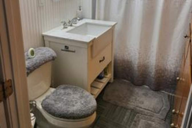 Bathroom has Slate Floor & Tile Shower/Bath - 1 BR in Sunny, Large, Safe 4 Bedroom (near North Campus) with Parking, W/D in Unit Triplex