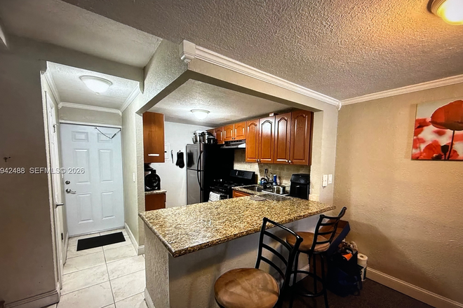 front door-kitchen - Villas of Pinecrest