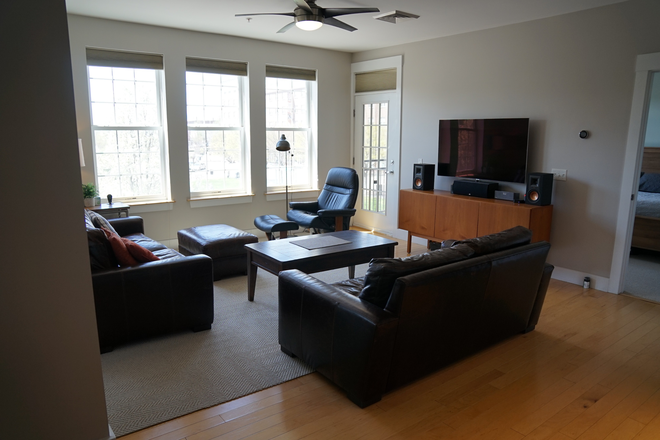 Living Room (does not come with furniture) - 60 Winooski Falls Way #1211, Winooski, VT 05404 Apartments