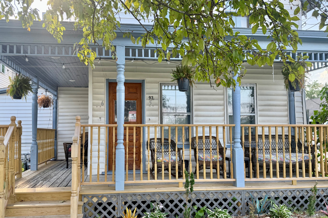Front Porch w/ Furniture - Great Bedroom in 2 Bedroom Furnished Apartment with In Unit Laundry and Off Street Parking