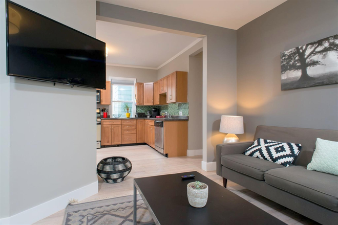Living Room - Modern Central Sq 3 Bed with In Unit Laundry + Open Concept Kitchen