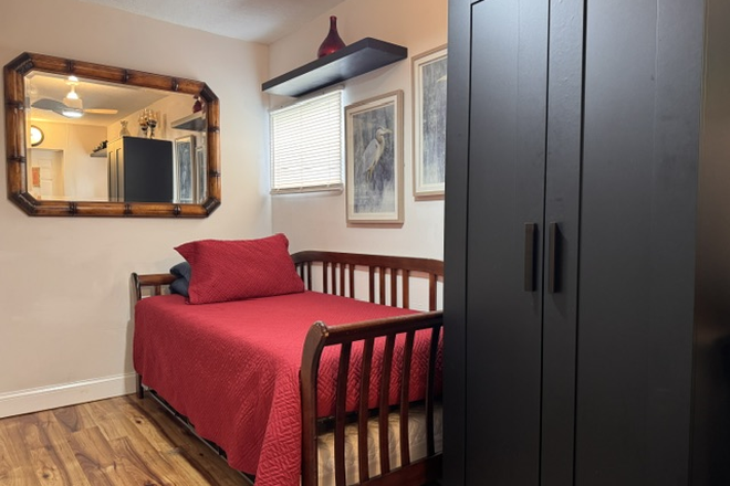 Bed area. - Studio with Private Entrance – ALL Utilities Included! Mins to NSU! Apartments