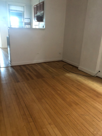 Dining room - Taylor and May,  3 Blocks from UIC Campus, 2 Bedroom, 1 Bathroom Apt. Enclosed Porch. Hardwood floor