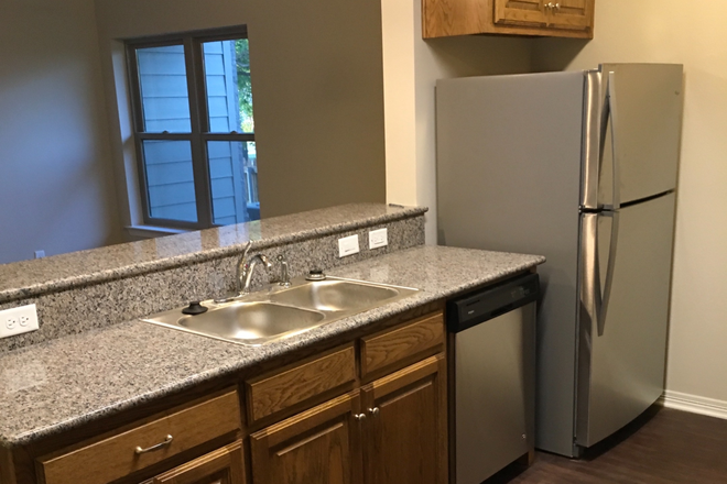 Kitchen View 1 - DOWNSTAIRS UNIT AVAILABLE for August 2025. ACROSS FROM UNT PARKING LOT #54-T  **UTILITIES Included Apartments