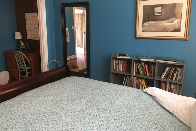 Main BR with art, books, full length mirror, queen size bed. - Frnshd 3 BR, 1.5 BA home, dk w/gs grll,snny rms,flowers/herbs/fruits,short wlk to grcry, dinr,bgls.