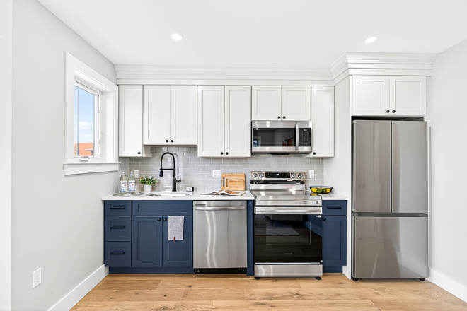 kitchen - New construction 3 bed with AC and private balcony - NO FEE! Apartments