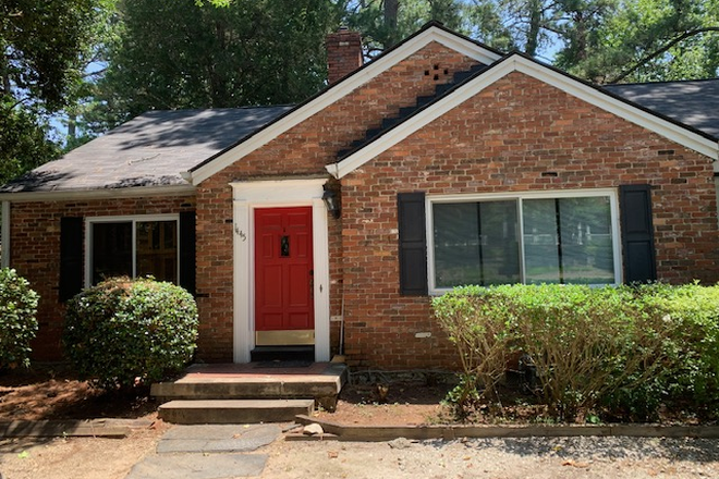 fornt of the property - Unit A in a triplex  next to Emory campus with a circular driveway.