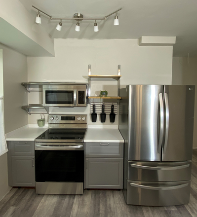 Kitchen fridge and stove - Student Housing NOW LEASING FOR 2026-2027 Duplex