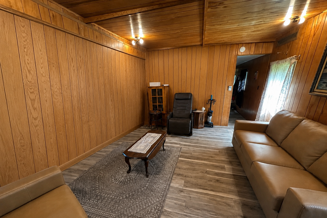 Living room - Home  with private lawn located less than 3 minutes from campus