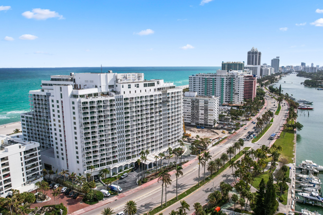 Building Front - Stunning Fully Furnished 3/2 Condo with Direct Ocean Views, Massive Balcony and Two Parking Spaces!