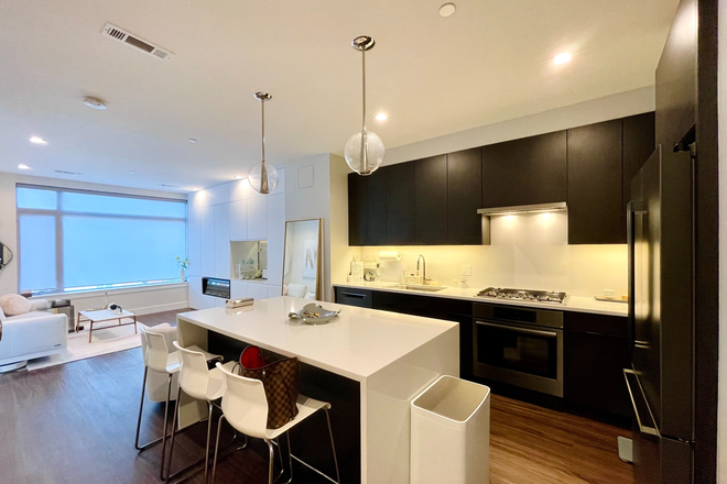 Living Room & Kitchen - Harbourview Luxury Apartment, 1b1b + den, 2 minute walking distance to MBTA