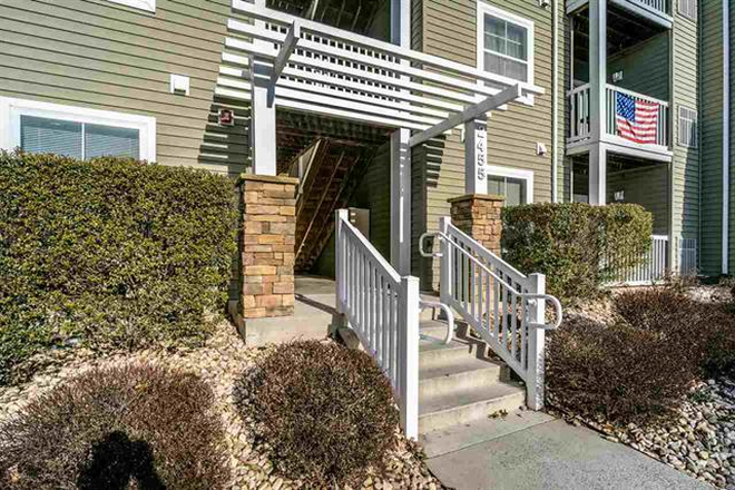 Entrance to 2455 Building - Campus View Apartments Overlooking the Pool and JMU