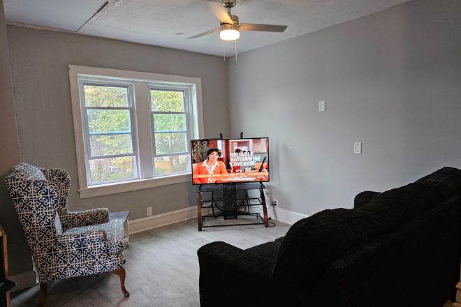 Cozy Living Room with comfortable couch, lounge chair, & collapsable table for company! - 2nd FL | Luxe *Furnished* Student Housing Pod... 4 Blocks to St. Joseph's University! Duplex