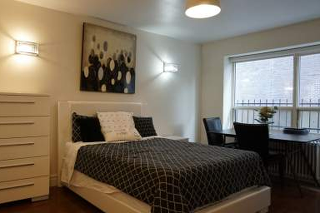 Living Area - 710 Spadina Ave #105: Studio unit located in the heart of the Annex Apartments