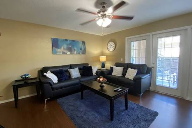 Living room - Boardwalk at Alafaya Trail Apartments