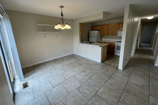 Living Room and Kitchen, photo from www.zillow.com - Looking for one roomate! 3Br/2Ba, In-Unit Washer/Dryer