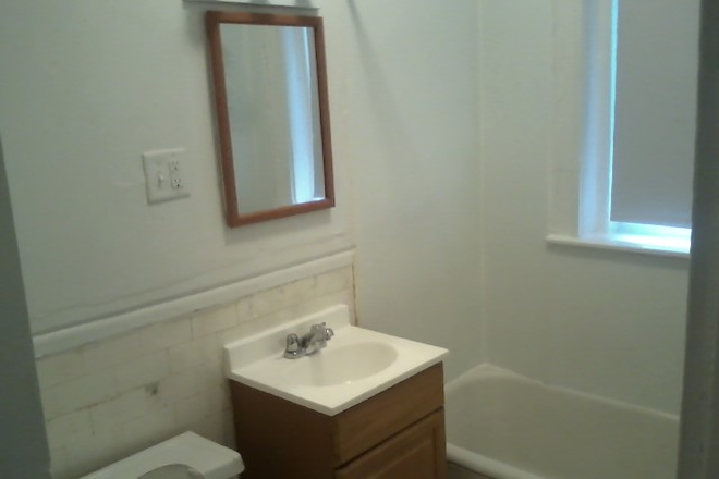 Visit hubrealtyproperties.com - Front facing 2 bedroom, with spacious kitchen, on green line T Apartments