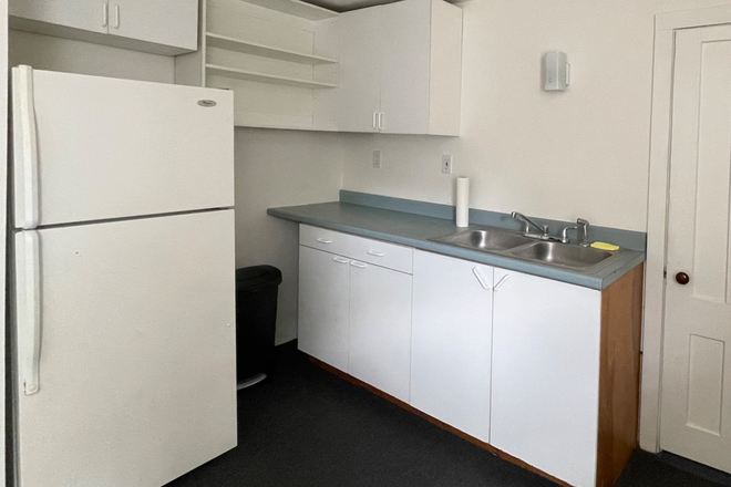 Kitchen counter, sink and refrigerator - 2 Room 2nd Floor Apartment For Rent on N. Union St.