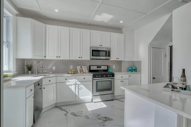 Kitchen from Dining Room - Summer 2025 Special: Charming Maryland-Themed Room at "The Baltimore" Townhome