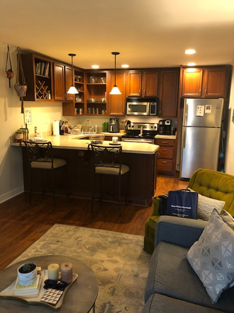 Combined Den/kitchen, stainless steal, - Villager East Condo, great neighborhood street, next to Starbucks, mall, and bus stop.