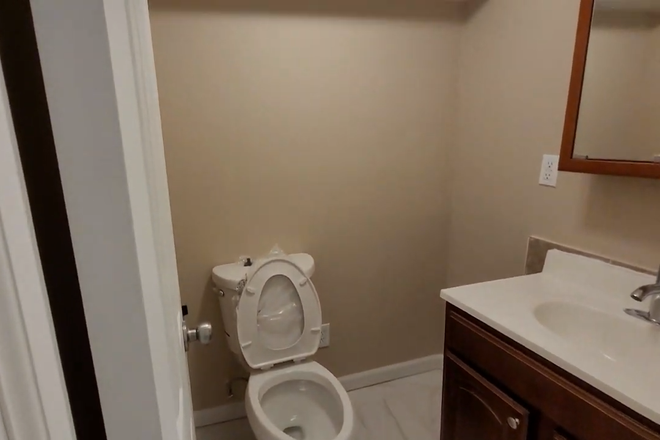 Restroom - 1 - Sunset Park Basement Apt: 4 Beds / 2 Baths - All Utils Included!