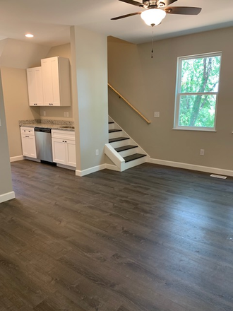 Living Space from Entry - Duplex **3 Bedroom ** 3 Bathroom** 1 Mile From Campus**Steps From Cat Bus Duplex