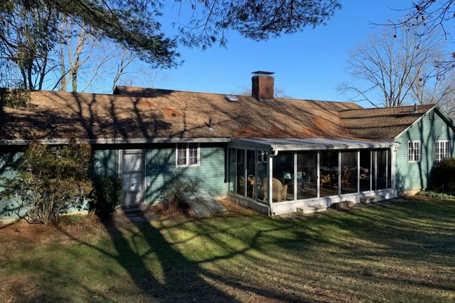Sunroom and backyard - Beautiful family home for rent on quiet residential Mill Lane in Amherst