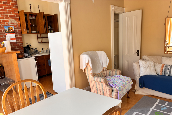 living room + kitchen - Serene 1-Bedroom Lower Pacific Height Fillmore Apartments