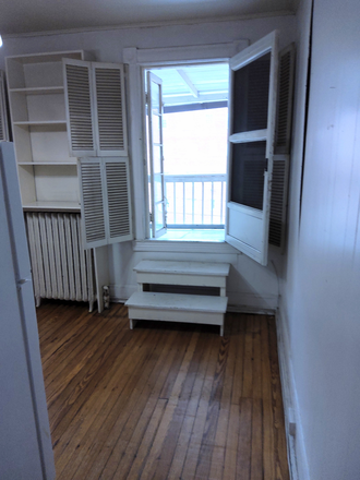 Den exiting to Deck - 1-bedroom apartment with den and private deck close to Homewood Campus