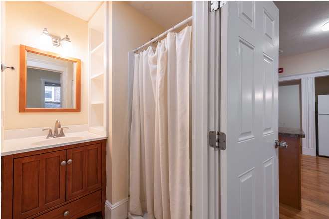 Hub Realty - Mission Hill, sunny front facing 4 bedroom 2 bathroom on Green line T Apartments