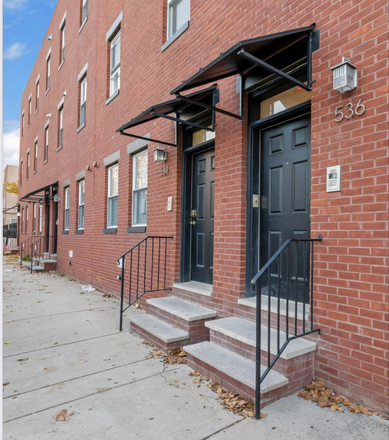 Front door - Modern three bedroom apartment with a gym and onsite parking!