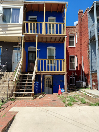 REAR PARKING WITH MAIN AND LOWER LEVEL DECKS - Spacious 3 level townhome close to campus and metro. 3 bedroom, 2 bath, laundry and more!