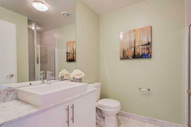 Bathroom - 1 Furnished Bedroom with Washroom and Shared Kitchen in 55 Bremner Blvd. Condo