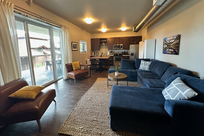 furnished living room and kitchen with pantries for each roommate - 1 room with attached dedicated bathroom at The Lux Building-with AC & in unit washer/dr Apartments