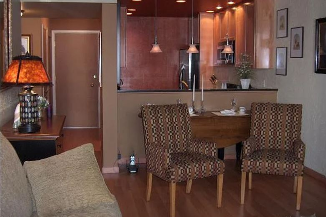 Entry hall into living area - 3 bd/2 bath great location- huge balcony and IN UNIT washer and dryer! Condo