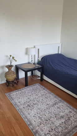 Room with bed and side table - Beautiful newly painted fully furnished large room. 5 miles from UCI.Community pool & jacuzzi
