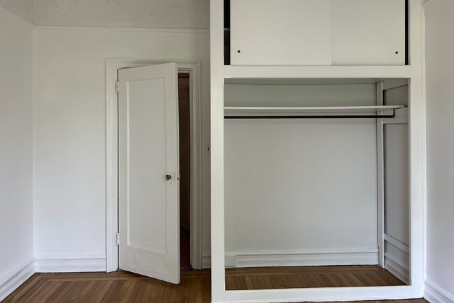 Bedroom door and closet, looking east - Big Sunny Room in 2 Bed Coop Apartments