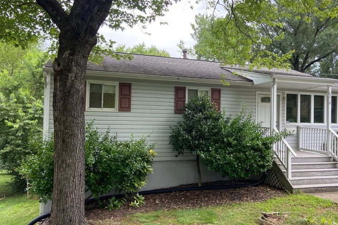 Front of house - Spacious 4 BD, 2 Bath House in Berwyn Heights, Large Private In-law Suite, Beautiful Yard, New Deck
