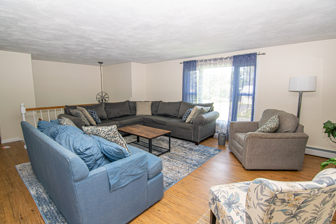 Living Room - Available for a group of 5! 5 Bedroom home in Eastward Look!