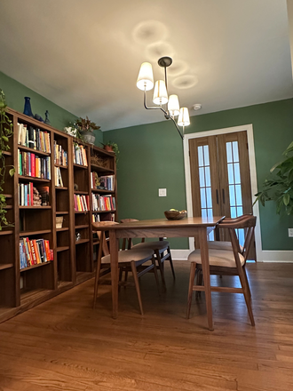Dining - Lots of bookshelf space - Avondale -Furnished House w/ Yard