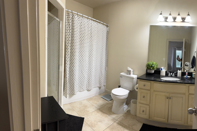 primary bedroom's bath with separate shower - Discounted rent at Houndstooth Condos for sub lease-mid December 2025-July 2026