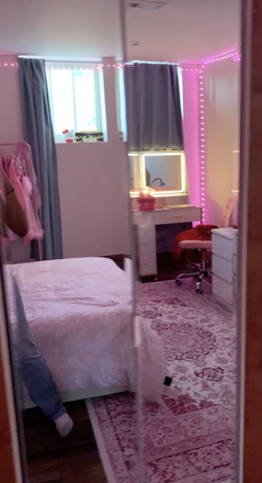 Mirror view from glass closet showing windows, bed, dresser, and vanity desk. Please message me for a full video! - Summer Sublet Across from CTA Station
