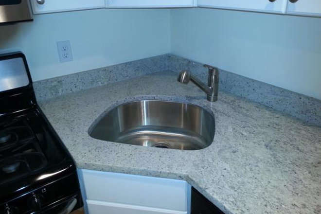 Visit hubrealtyproperties.com - Beautiful 3 bedroom with dishwasher, across from BU West Campus Condo