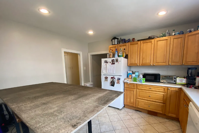 Call NOW for showings! 617-236-8600 - FOSTER ST - XL 1ST FLR 4BR/1BA NEAR BC AVAIL *9/1/2027* W/ IN UNIT LNDRY, GRG PRKNG, EIK, DW, YARD Apartments