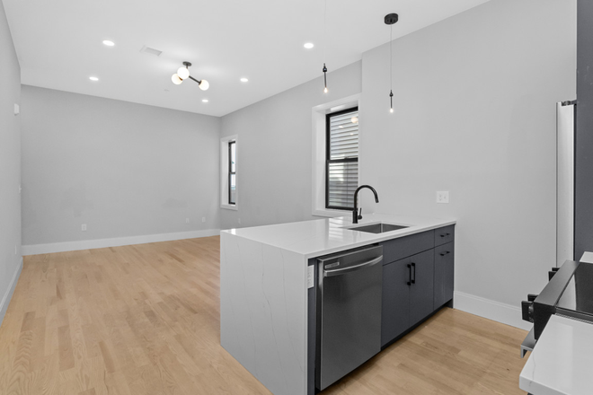 Call NOW for showings! 617-236-8550 - SUMNER ST - LUXE TOP FLOOR 3BR W/ 2 MAIN BATHS, W/D IN UNIT, A/C, DW FOR *9/1/2026* NEAR MAVERICK SQ Apartments