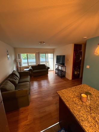 Living room and deck - Spring 2026/ must sublet ASAP - major rent reduction and $500 cash back! Apartments