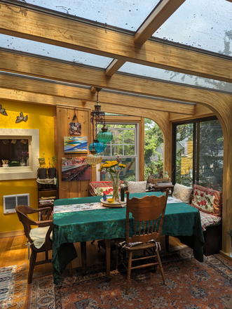Sunroom and table - Beautiful Condo 2BR/1.5B - Includes Utilities