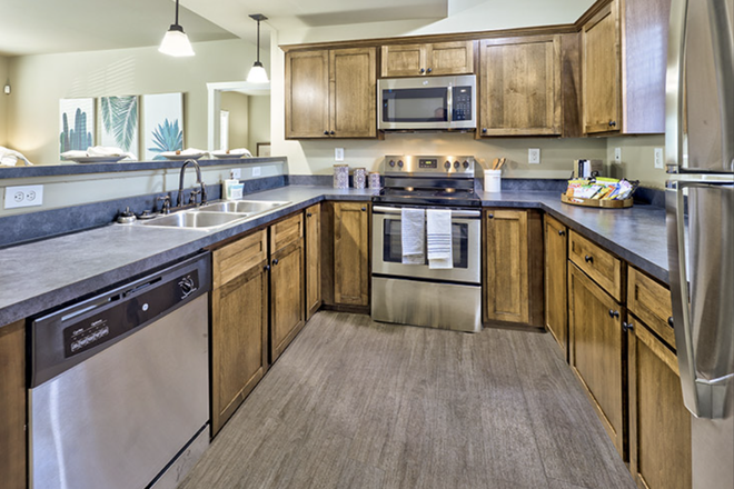 kitchen - 2bed 2bath at the Lodges of East Lansing Apartments