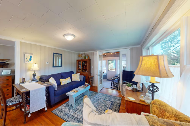 Living room through to deck - 60 Pettaquamscutt Lake Road Narragansett UTILITIES INCLUDED* Quiet Neighborhood Lake/Beach House